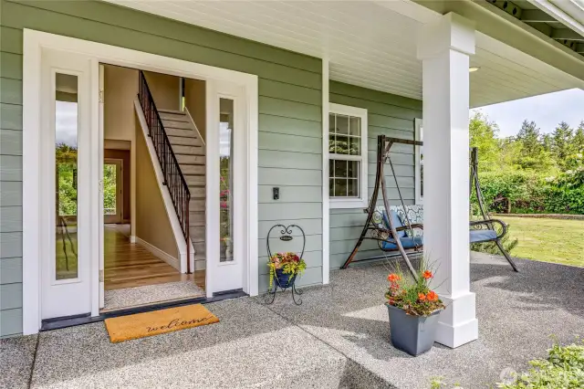 Inviting porch entry to this beautiful updated home. Sit a while and enjoy nature and the sunsets.