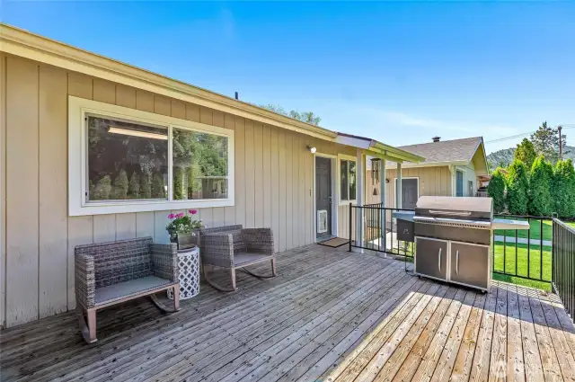 Back deck looking towards home and detached garage