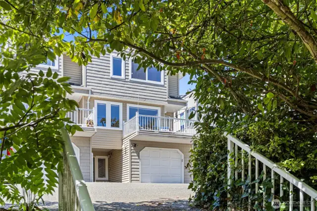 Gorgeous 2,400+ sq ft Greenwood townhome lives large and is packed with upgrades and flexibility, including a 2001 roof.