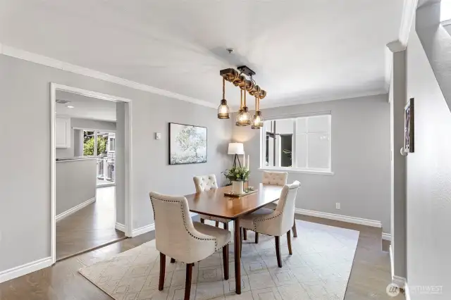 Nestled between the kitchen and the living room, this true dining room is just right for those big gatherings and Holiday parties!