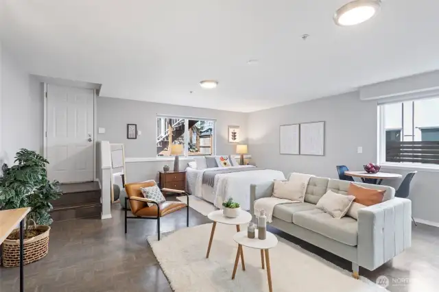 This entry level area is large and can be used in a variety of ways. With its own backyard entrance, it is ideal as an extension to the main house, as an entertainment room or a guest suite or a separated studio for additional income.