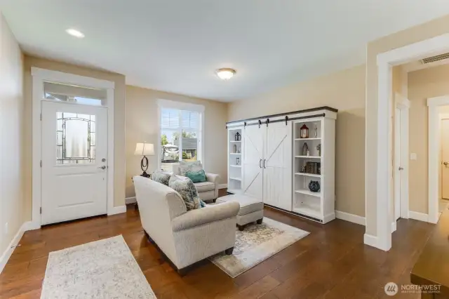An inviting second living space to make your own. (Wall shelves are unattached and are not included in the sale.)