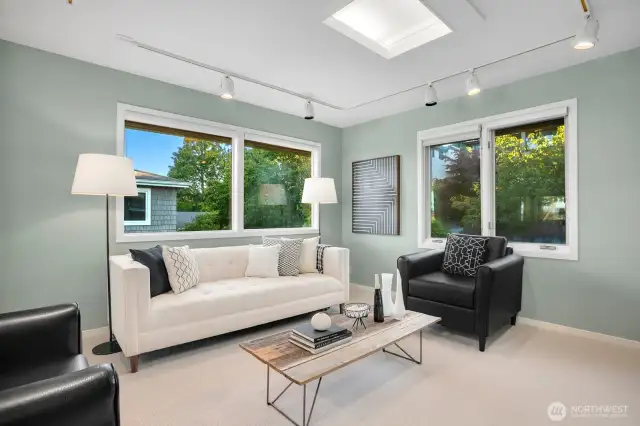 Primary suite is large and has an area for seating or home office
