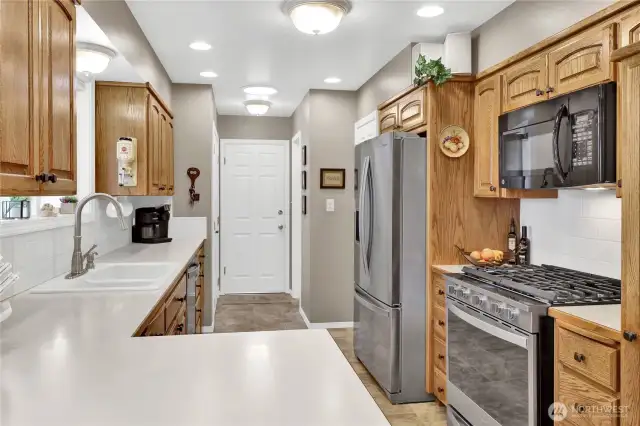The appliances are all fairly new, with the fridge and stove just around two years old, and the fridge even comes with an extended warranty for added peace of mind.