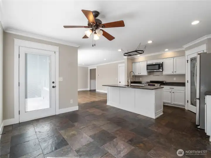 Large open kitchen with custom touches and a walk in pantry