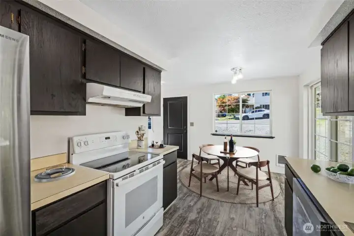 Virtual Staging-Refreshed cabinets, comfortable galley kitchen.