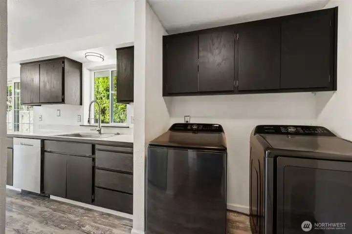 Laundry off of kitchen.