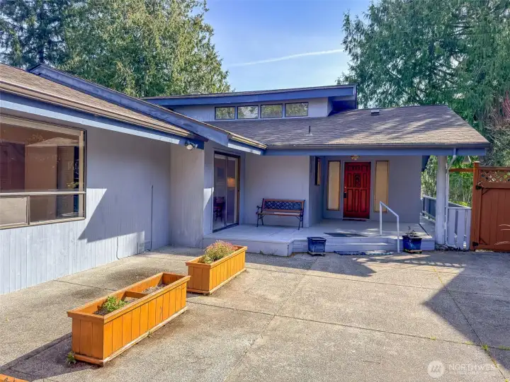 Courtyard ad front entry. Sliding glass door off Kitchen Nook