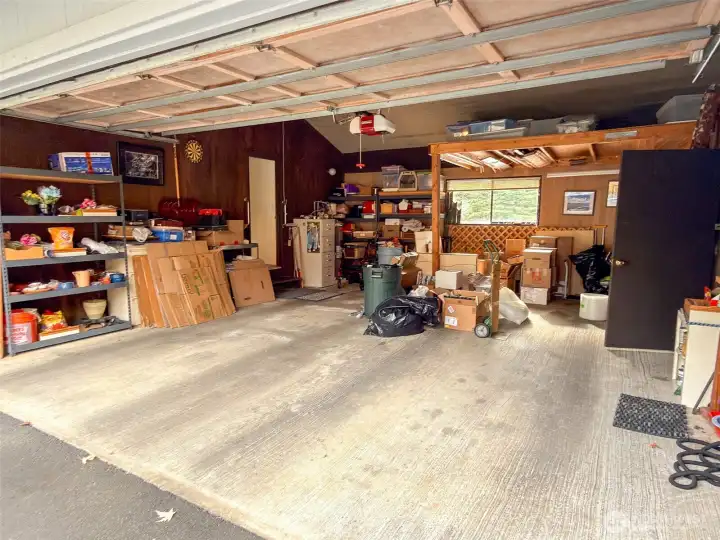 2 car garage with built in storage room and loft