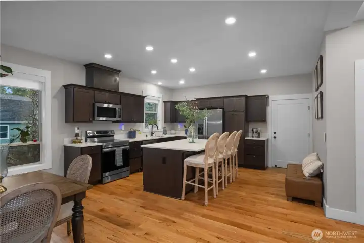 Seamless flow from kitchen to dining room.