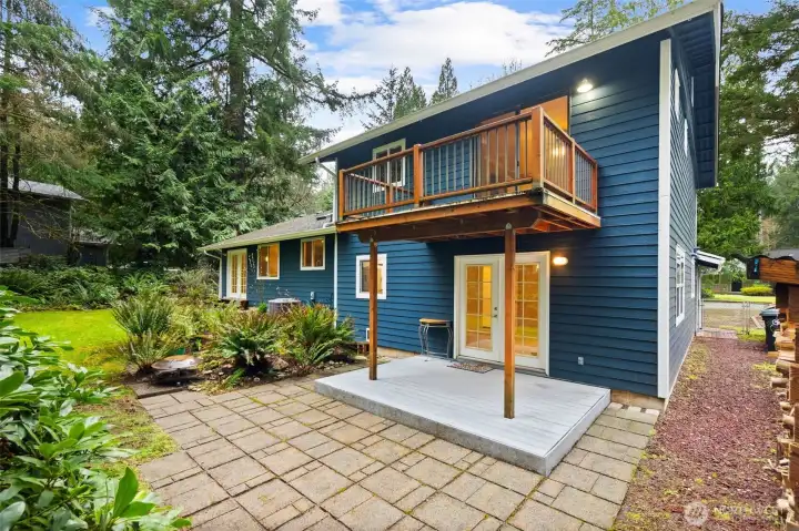 Covered deck and Primary Bedroom Balcony