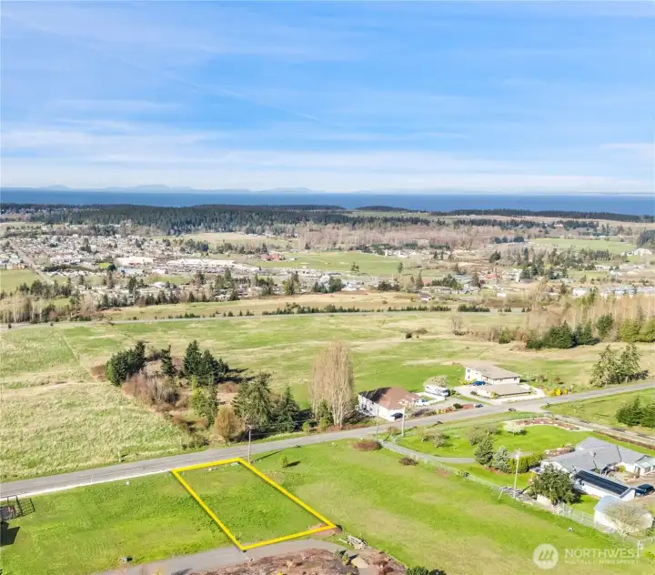 Lot 2 Aerial North-facing view with proximity to the City of Sequim, Strait of Juan de Fuca and Vancouver Island