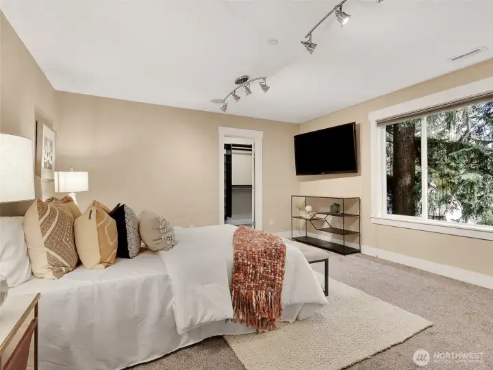 Spacious primary suite with room to unwind and recharge