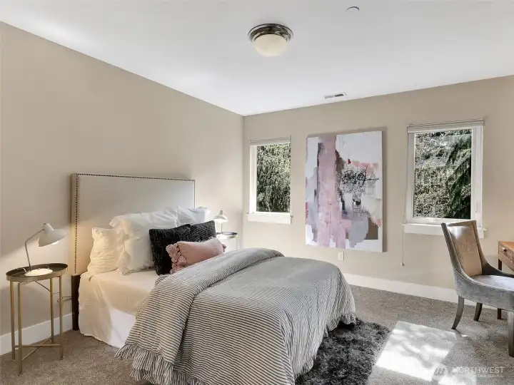 Generously sized bedroom with flexibility for guests, office space, or everyday living