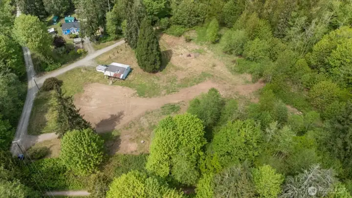 The hard part is done with already having septic, well and power on site. Build or bring in a manufactured home.