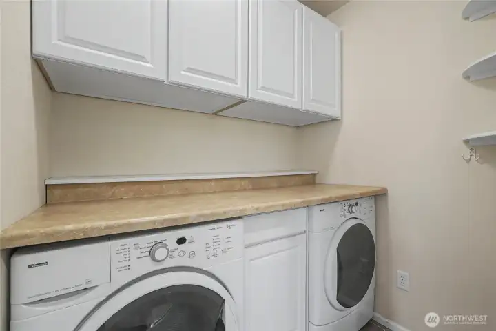 Utility room view, love all the cabinets!