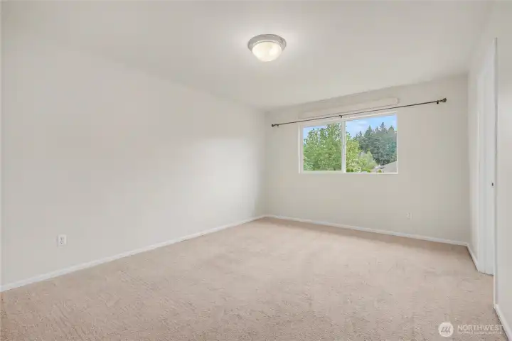 Primary suite view without virtual staging.