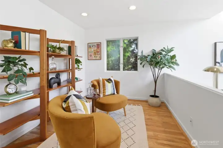 Flex space above living room with half bath.