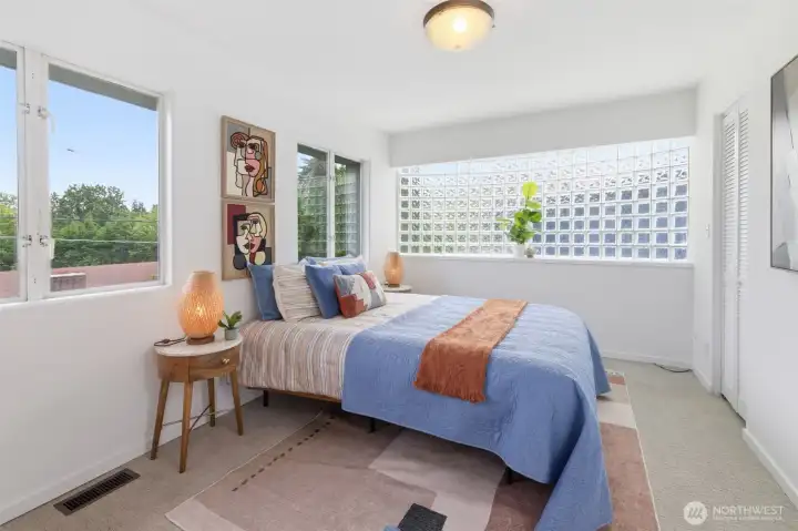 Primary on top floor w/ walk in closet and on suite bathroom.