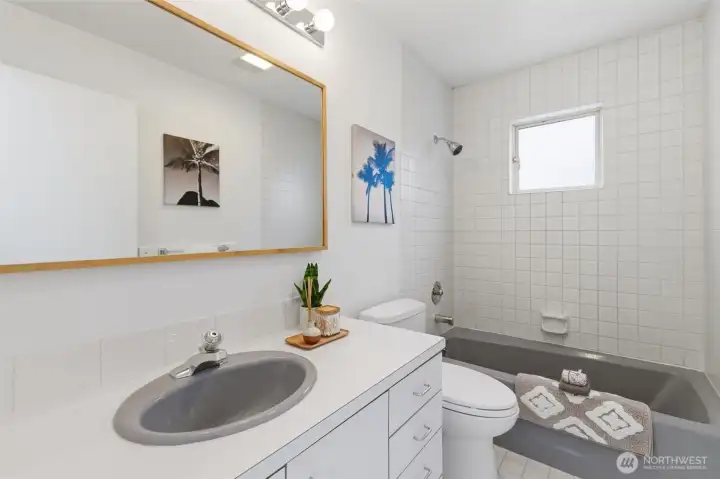 Second full bath on top floor.