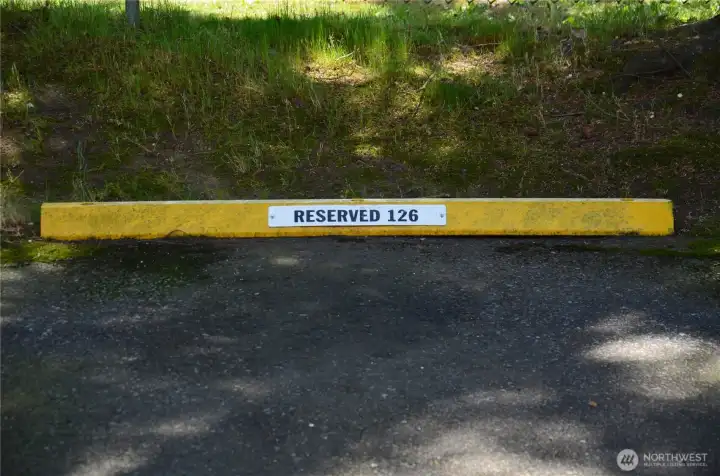 Reserved parking steps away from rear entry. Reserved parking steps away from rear entry.
