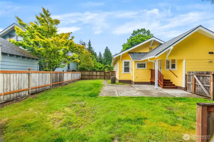 Nice large fenced backyard with covered porch and room for gardening and relaxing. Nice large fenced backyard with covered porch and room for gardening and relaxing.