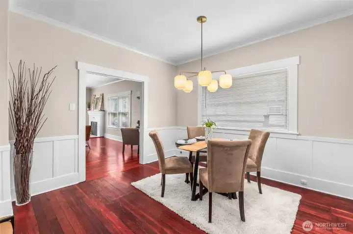 This roomy space with wainscotting is traditionally the dining room, but could also be a den/office space or sitting room. This roomy space with wainscotting is traditionally the dining room, but could also be a den/office space or sitting room.
