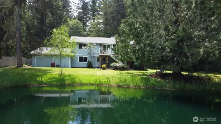 The property has approximately 100 feet of no bank lakefront just off the main body of the lake.