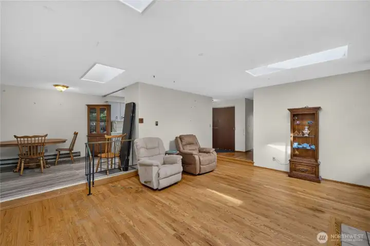 Living room adjacent to kitchen and family room Living room adjacent to kitchen and family room