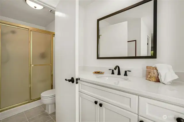 Separate shower and new vanity.