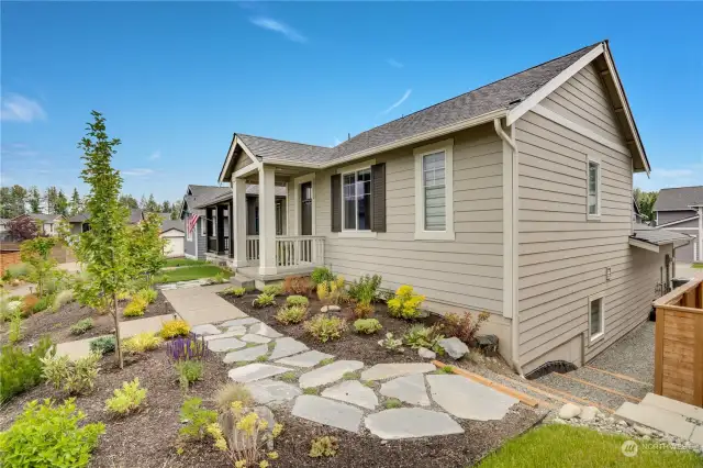 Flanked by custom flagstone pathways and delicious gardens, you'll be proud to call this move-in ready home yours.