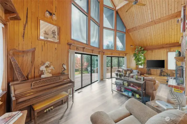 Living room with floor to ceiling windows