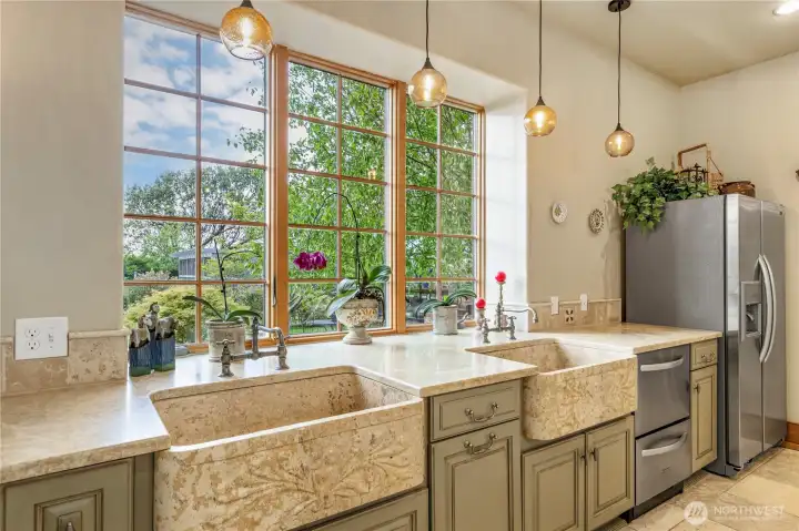 Twin limestone apron front sinks make it