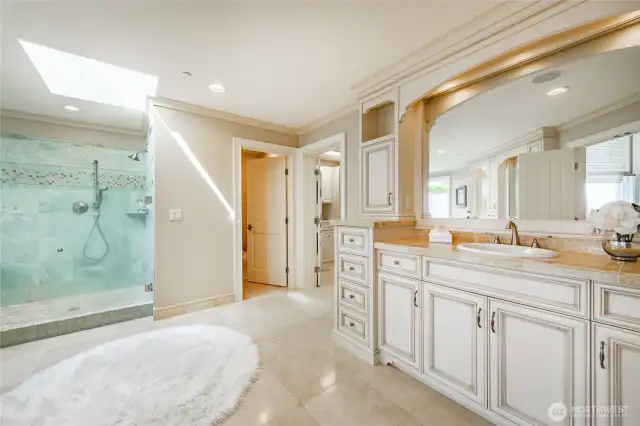 Dual vanities, soaking tub, private restroom