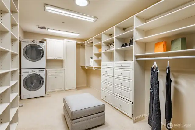 Oversized walk-in closet with private laundry