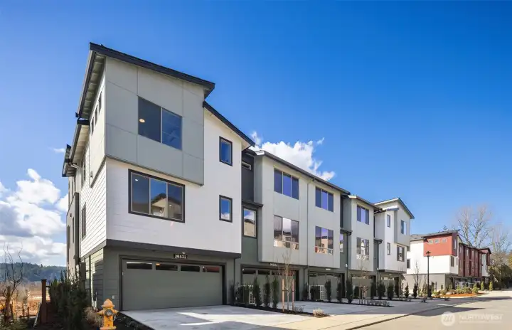 Gorgeous end location with 2-car garage PLUS 2-car driveway