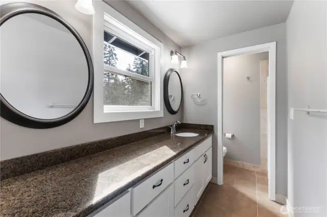 Upstairs primary suite bathroom.