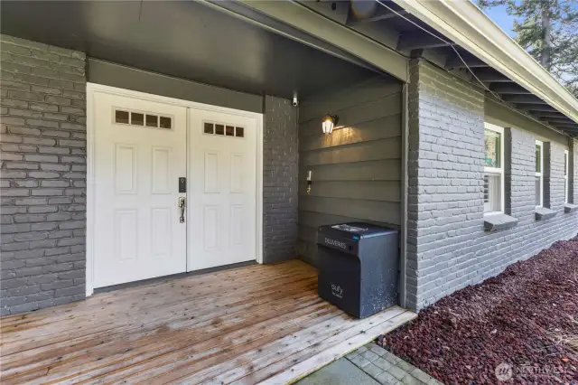 Spacious, welcoming entry with delivery locker.