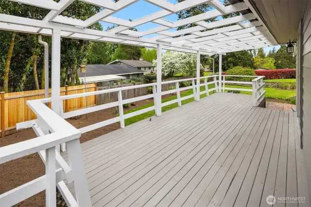 Here we go! Large deck overlooking the backyard. This is the perfect spot to BBQ and enjoy relaxing outdoors. Great for entertaining too!