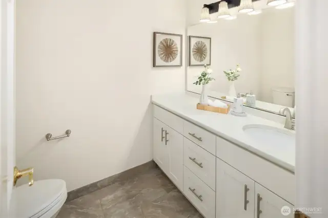 Main level remodeled powder room.