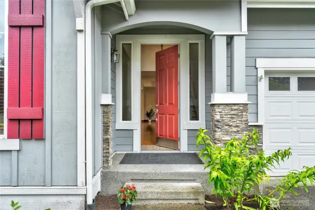 Freshly painted front door invites you inside.