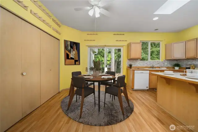 Virtually staged eat-in area of kitchen.