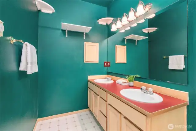 Primary bathroom will look great with a new coat of paint! Double sinks, lots of storage, and a separate toilet room.