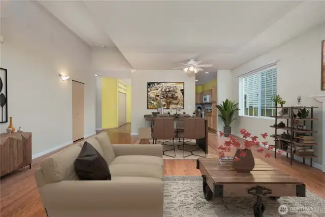 Virtually staged living into dining room.