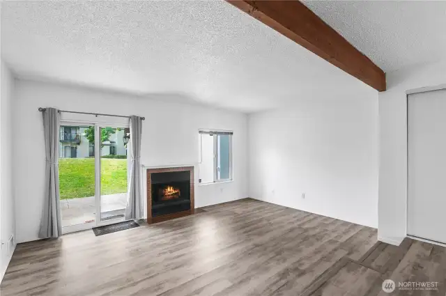 Electric fireplace is ready to turn on at the flip of a switch for heat and ambience.