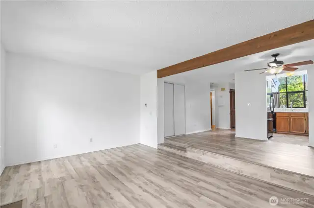 A small step in between the dining room and living room sets off your two spaces.