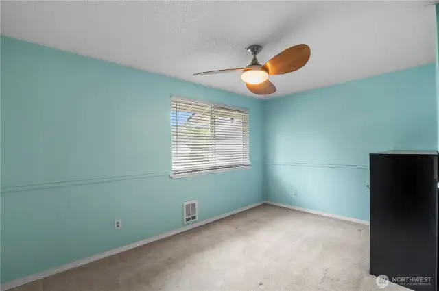 2nd bedroom is painted ocean-blue (but we could make it white if you really need us to).
