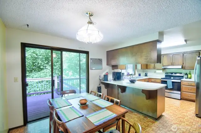 Dining room that leads to back deck.
