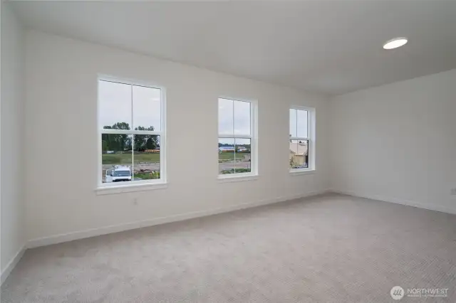 Large Upstairs Bonus Room. Pics are of a different 3049 plan. Features and colors may differ.