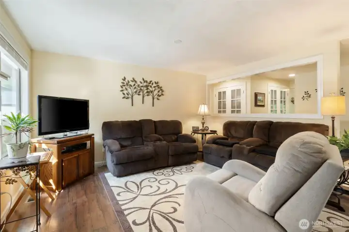 Comfy Family Room Overlooks a Scenic Backyard